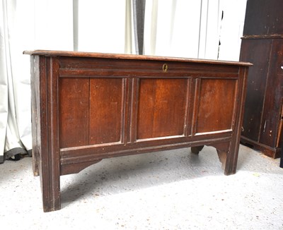 Lot 533 - An 18th century oak coffer, with three panel...