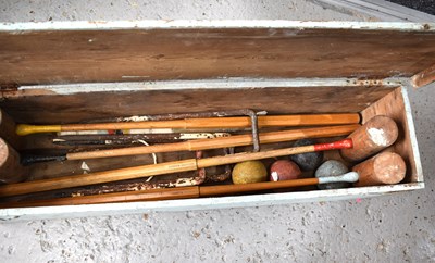 Lot 400 - A vintage croquet set, the mallets having...