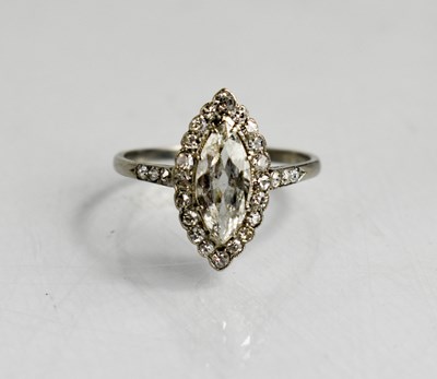 Lot 33 - A platinum and diamond ring, the central...