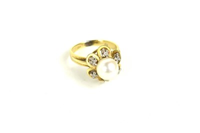 Lot 224 - A 9ct gold pearl and diamond flowerhead form...