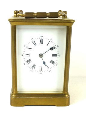 Lot 367 - A French brass carriage clock with Roman...