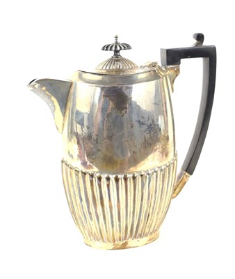 Lot 267 - A silver coffee pot, with a gadrooned embossed...