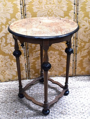 Lot 544 - A mahogany and ebonised occasional table with...