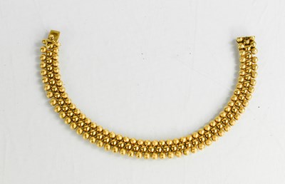 Lot 7 - An 18ct gold bracelet, composed of...