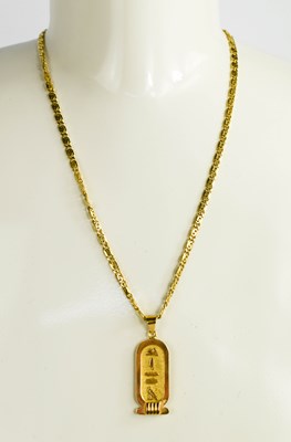 Lot 9 - An 18ct gold pendant necklace, the necklace...