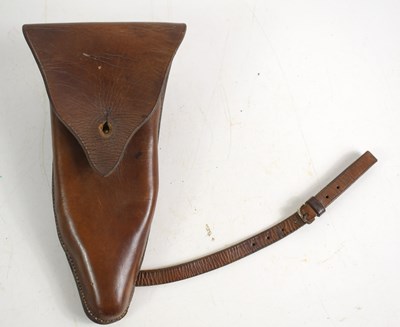 Lot 119 - A WWI era leather holster with Sam Browne...