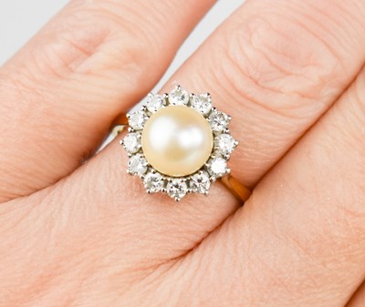 Lot 1 - An 18ct gold, pearl, diamond and platinum ring,...