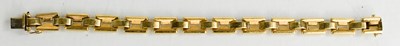 Lot 6 - A 14ct gold bracelet, composed of rectangular...