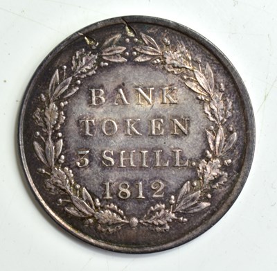 Lot 141 - A George III Bank token, draped and laureate...
