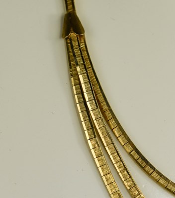 Lot 10 - A 14ct gold necklace, the single strand...