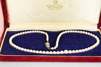 Lot 182 - A Mikimoto pearl necklace, composed of...
