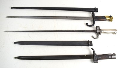 Lot 70 - A group of bayonets to include a French 1892...