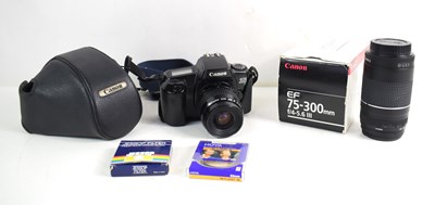 Lot 368 - A Canon EOS 1000F camera together with a pair...