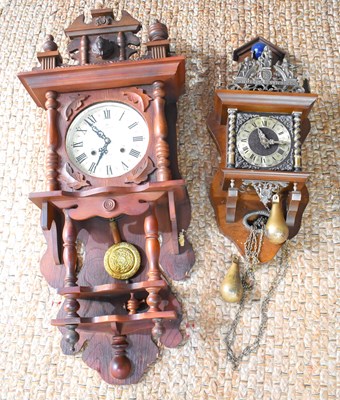 Lot 216 - A pair of wall clocks to include a Dutch...