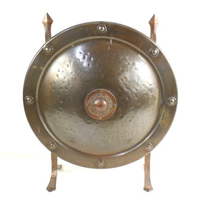 Lot 542 - A late 19th century copper fire screen of...