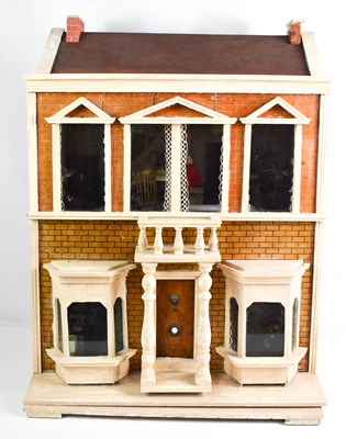 Lot 364 - An antique dolls house, of Victorian red brick...