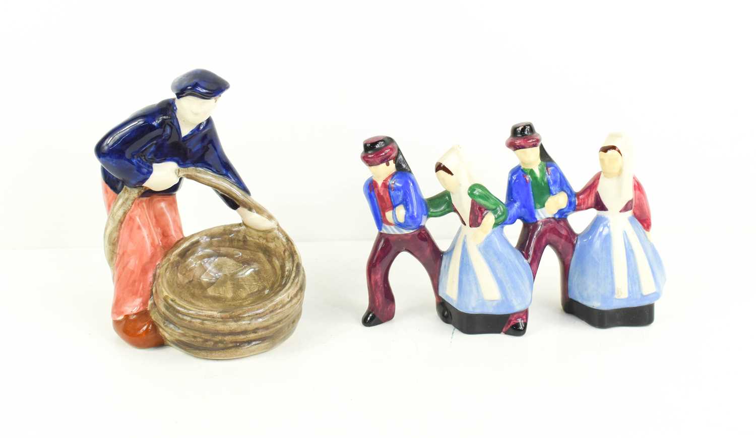 Lot 289 - Henriot Quimper pottery figurines; a group of...
