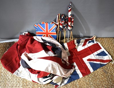 Lot 76 - A group of 1940s and later Union Jack flags,...