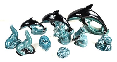 Lot 293 - A collection of Poole pottery animals in a...