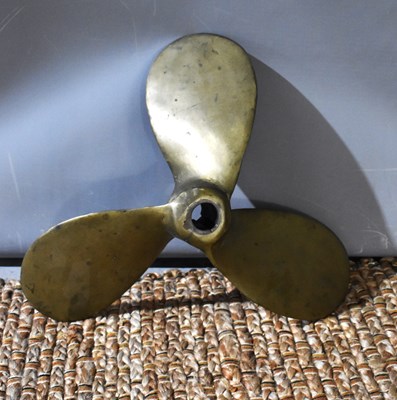 Lot 377 - A bronze ships propeller measuring 40cm wide.