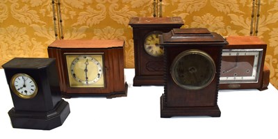 Lot 222 - A group of 20th century wooden mantle clocks...
