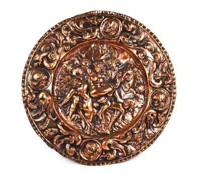 Lot 541 - A Spanish/Continental embossed copper charger,...