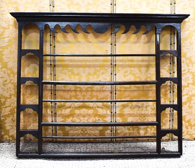 Lot 554 - A 19th century style wall rack with shaped...