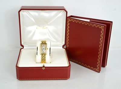 Lot 58a - An 18ct gold and diamond Cartier wristwatch,...
