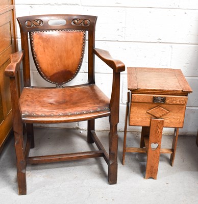Lot 572 - An Arts & Crafts period oak workbox with...