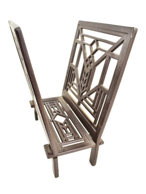 Lot 543 - A manner of Frank Lloyd Wright cast iron...