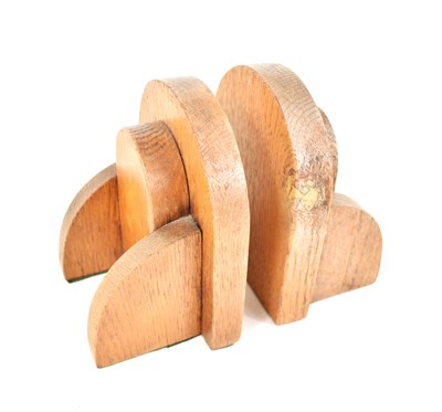 Lot 537 - A pair of Mid-Century oak book ends, 15 by 10cm.