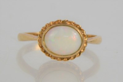 Lot 114a - A 9ct gold and opal oval ring, 2.4g, size O 1/2