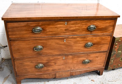 Lot 576 - A Georgian mahogany chest of three graduated...