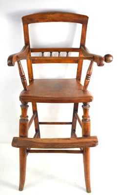 Lot 557 - An antique ash and elm childs highchair, seat...