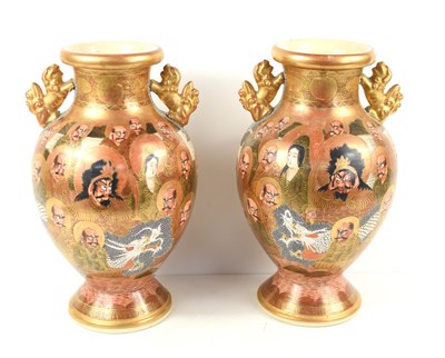 Lot 335 - A pair of Japanese Satsuma vases decorated...