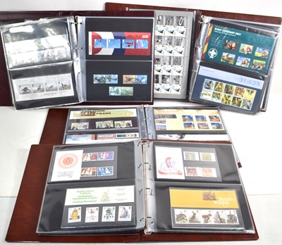 Lot 408 - A collection of Royal Mail stamp presentation...