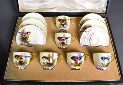 Lot 21 - A Royal Worcester set of six cups and saucers...