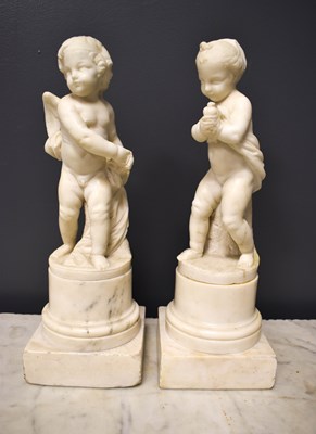 Lot 375 - A pair of 19th century French white marble...