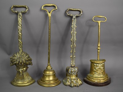 Lot 407 - A group of four 19th century brass and cast...