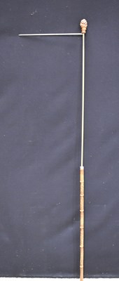 Lot 239 - A 19th century bamboo horse measuring walking...