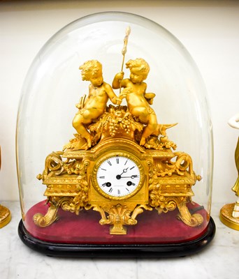 Lot 388 - A 19th century French gilt mantel clock, with...