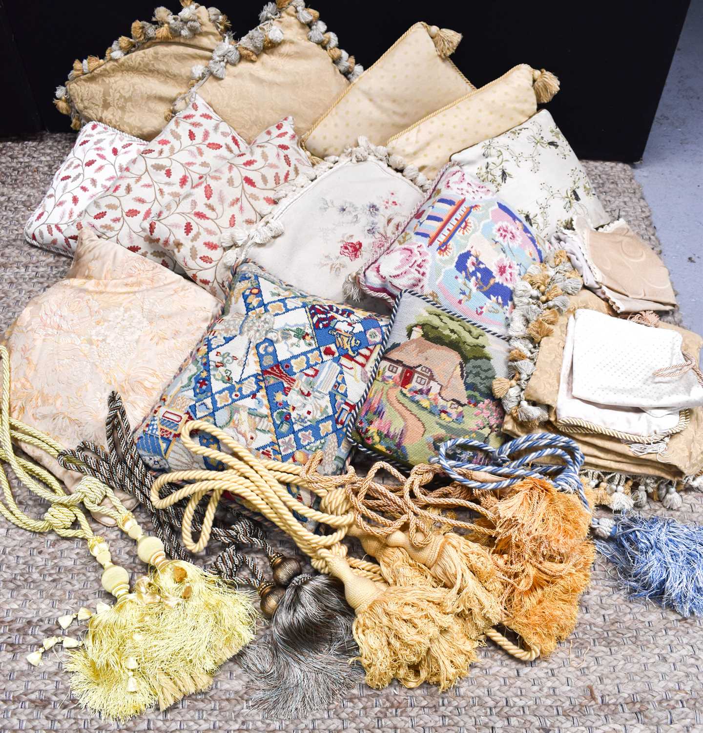 Lot 253 - Three cross stitch cushions, one with cottage...