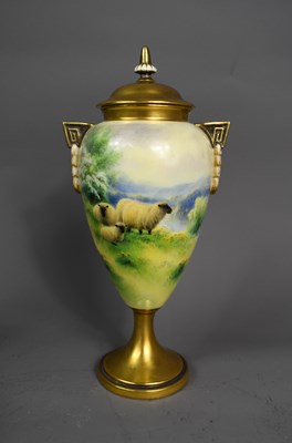 Lot 104 - A Royal Worcester porcelain vase and cover...