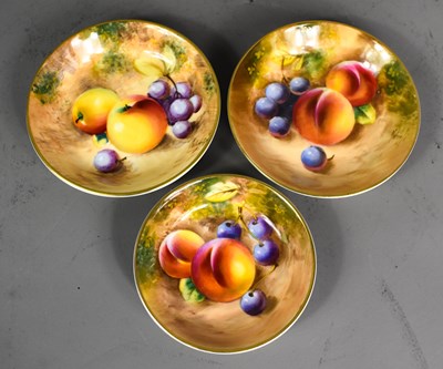 Lot 79 - Three Royal Worcester fruit painted dishes...