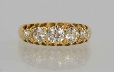 Lot 69a - An 18ct gold (unmarked) five stone diamond...