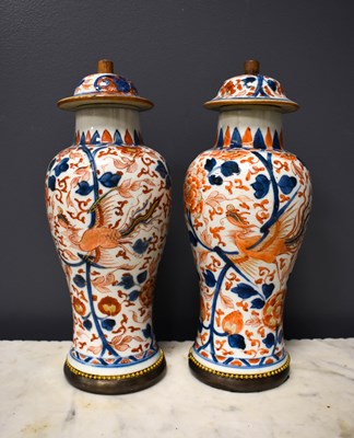 Lot 81 - A pair of early 19th century Japanese Imari...