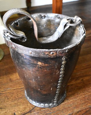 Lot 410 - A Georgian leather fire bucket copper studded...