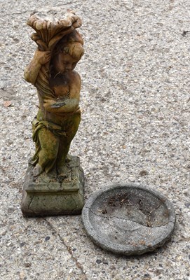 Lot 496 - A garden stone figure bird bath, 78cm high