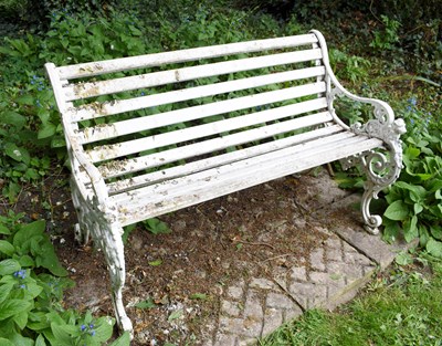 Lot 521 - A 19th century garden bench with ornate...