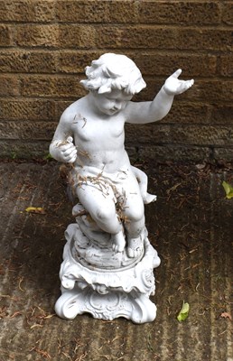 Lot 498 - A 20th century garden cherub figure on ornate...
